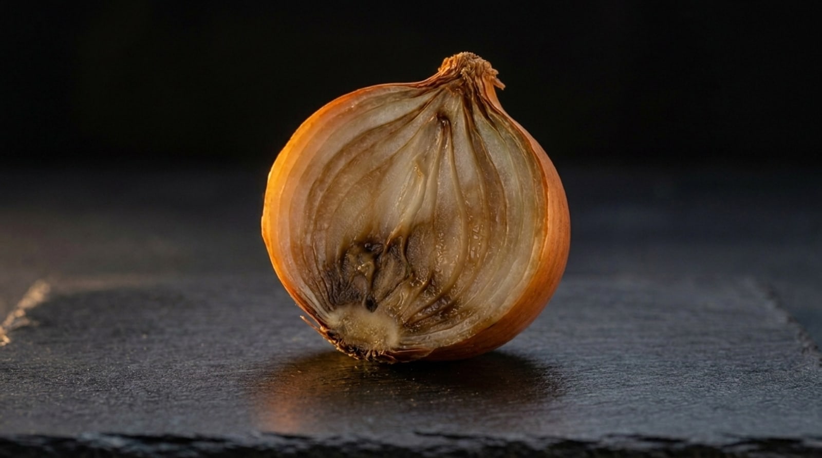 The same onion seen through near-infrared, internal basal rot revealed